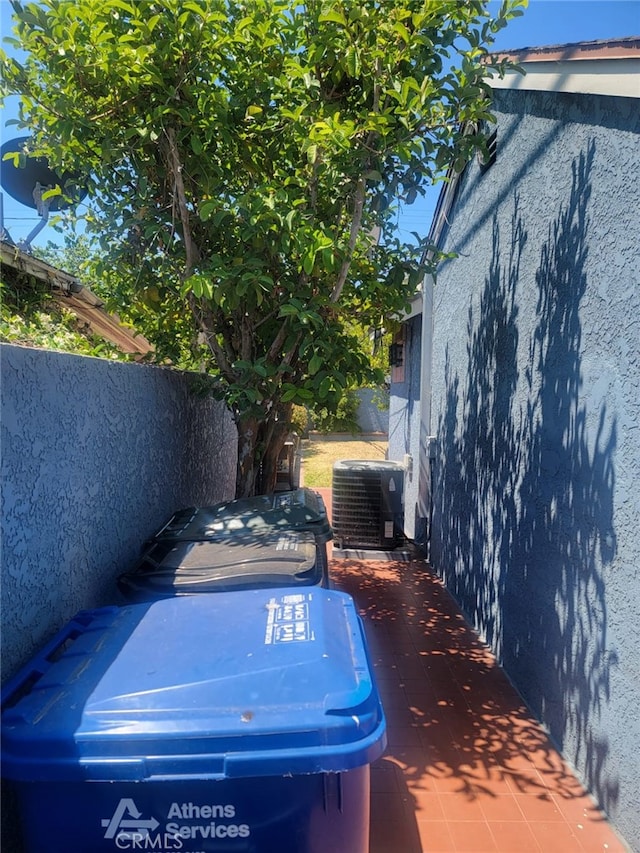 8502 Borson St, Downey, CA 90242 - view of side of property featuring stucco siding and a central air condition unit