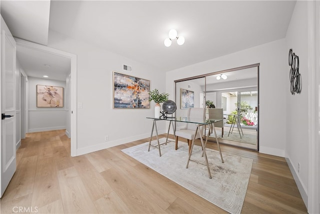 12 Creekside, Irvine, CA 92603 - dining area with light wood-style floors and a desk