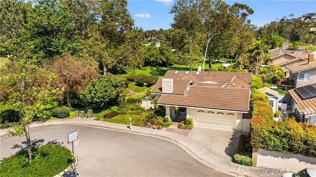 12 Creekside, Irvine, CA 92603 - view of subject property featuring a tree filled landscape