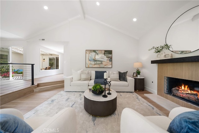 12 Creekside, Irvine, CA 92603 - living area featuring wood finished floors, a fireplace, and recessed lighting