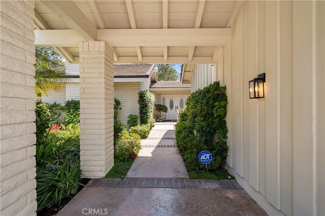 12 Creekside, Irvine, CA 92603 - view of exterior entry featuring board and batten siding
