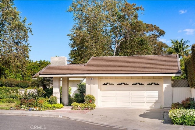 12 Creekside, Irvine, CA 92603 - garage featuring concrete driveway