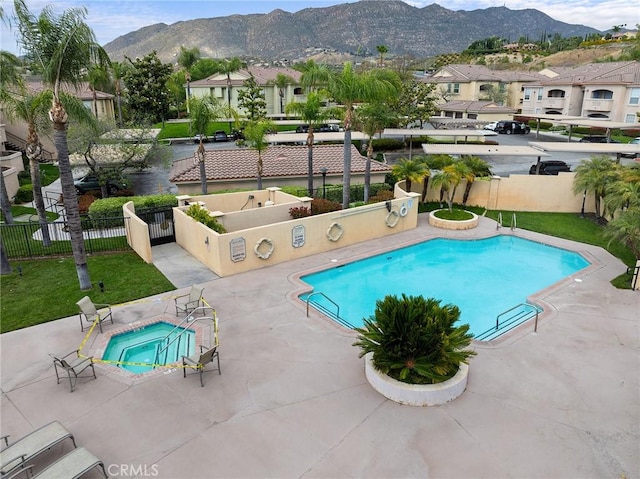 375 Central Ave Unit 196, Riverside, CA 92507 - community pool with a community hot tub, a mountain view, a patio area, and a residential view