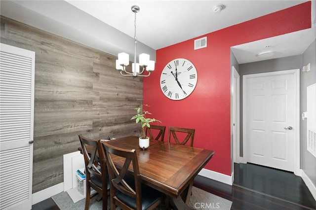 375 Central Ave Unit 196, Riverside, CA 92507 - dining space with a chandelier and an accent wall