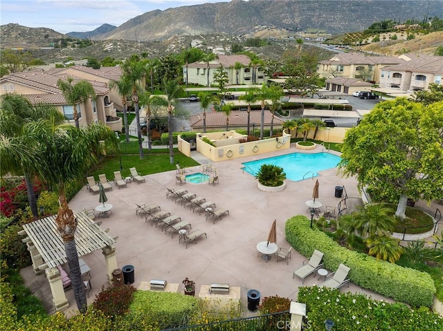375 Central Ave Unit 196, Riverside, CA 92507 - community pool with a mountain view, a residential view, and a patio