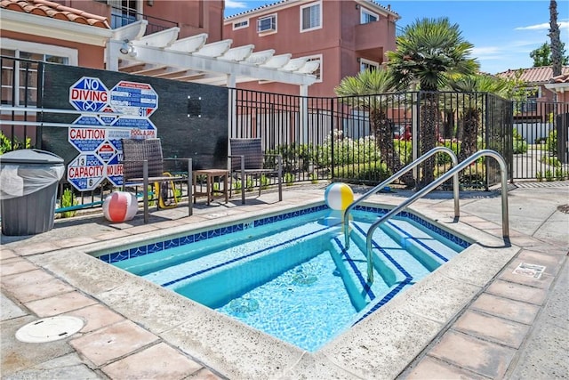 409 Utica Ave Unit C23, Huntington Beach, CA 92648 - view of swimming pool featuring a swimming pool and a patio area