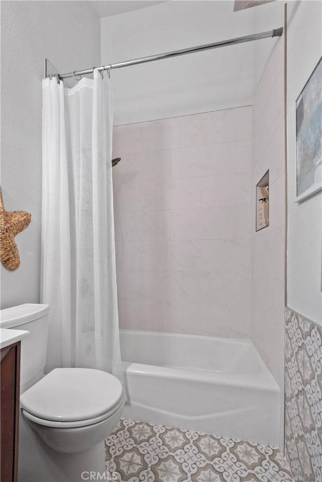 409 Utica Ave Unit C23, Huntington Beach, CA 92648 - full bathroom with vanity, tile patterned floors, and shower / tub combo with curtain