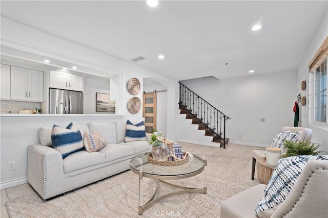 409 Utica Ave Unit C23, Huntington Beach, CA 92648 - living area featuring recessed lighting, light tile patterned floors, and stairway