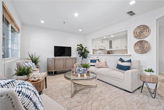 409 Utica Ave Unit C23, Huntington Beach, CA 92648 - living area with recessed lighting and light tile patterned floors
