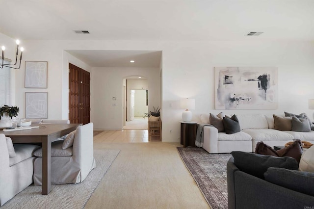 837 Calle Lagasca, Chula Vista, CA 91910 - living area with a chandelier, arched walkways, light colored carpet, and recessed lighting