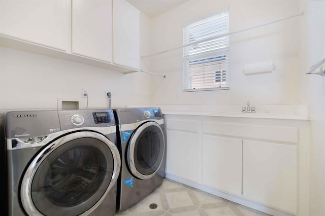 837 Calle Lagasca, Chula Vista, CA 91910 - laundry area with independent washer and dryer, cabinet space, and a decorative wall