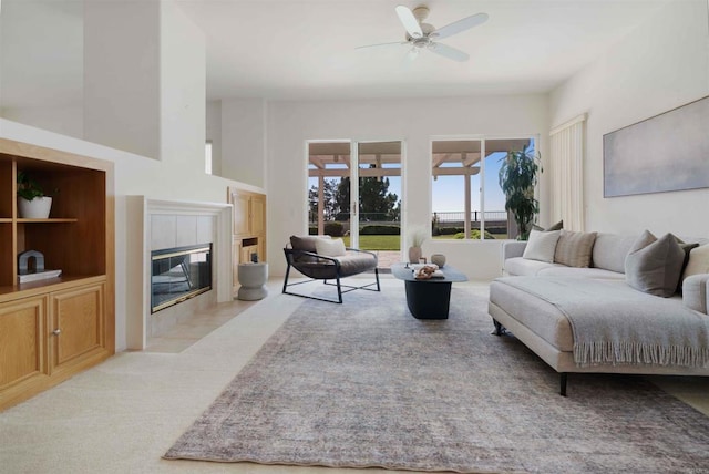 837 Calle Lagasca, Chula Vista, CA 91910 - living area with a ceiling fan, a tiled fireplace, and light carpet