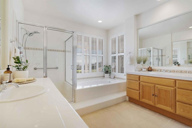 837 Calle Lagasca, Chula Vista, CA 91910 - bathroom featuring a stall shower, a bath, two vanities, and recessed lighting