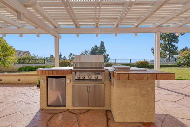 837 Calle Lagasca, Chula Vista, CA 91910 - view of patio with exterior kitchen and a pergola
