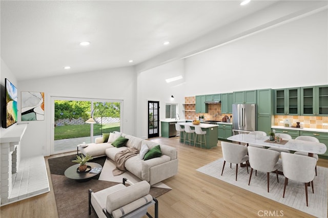 294 Calle Cuervo, San Clemente, CA 92672 - living area featuring high vaulted ceiling, light wood-style flooring, and recessed lighting