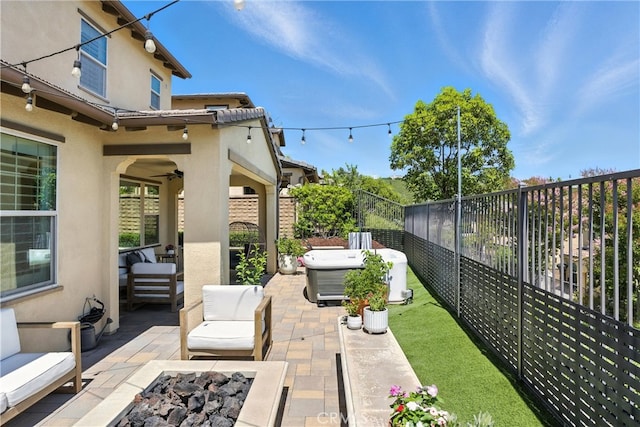12 Rastro St, Rancho Mission Viejo, CA 92694 - fenced backyard featuring an outdoor living space with a fire pit and a patio area