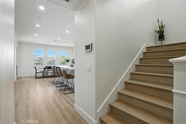 12 Rastro St, Rancho Mission Viejo, CA 92694 - staircase with recessed lighting and wood finished floors