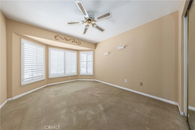 36151 Sharon Way, Yucaipa, CA 92399 - carpeted empty room with a ceiling fan and baseboards