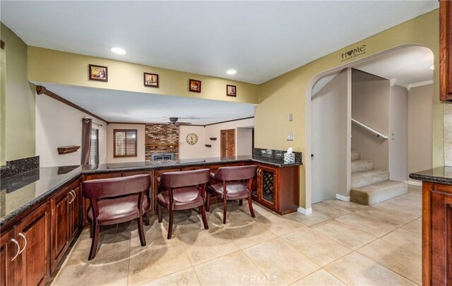 36151 Sharon Way, Yucaipa, CA 92399 - indoor dry bar featuring ceiling fan, stairs, light tile patterned floors, recessed lighting, and ornamental molding