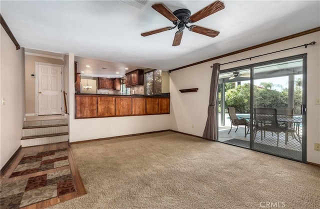 36151 Sharon Way, Yucaipa, CA 92399 - unfurnished living room featuring ornamental molding, ceiling fan, and carpet