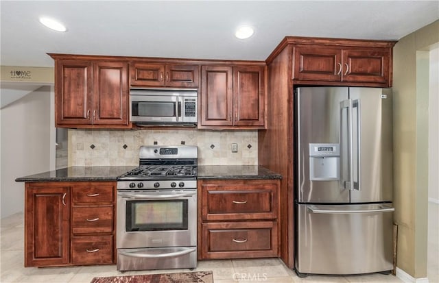 36151 Sharon Way, Yucaipa, CA 92399 - kitchen featuring appliances with stainless steel finishes, backsplash, dark stone countertops, recessed lighting, and light tile patterned flooring