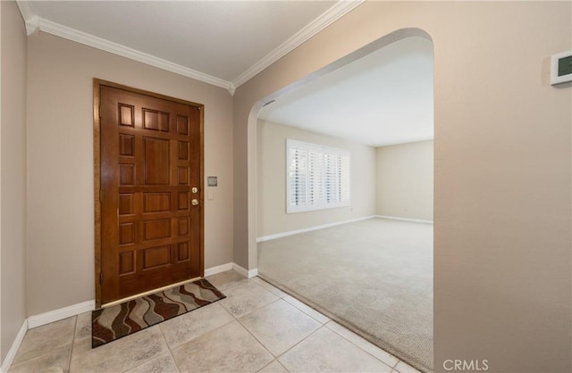 36151 Sharon Way, Yucaipa, CA 92399 - carpeted entrance foyer featuring arched walkways, crown molding, and tile patterned flooring