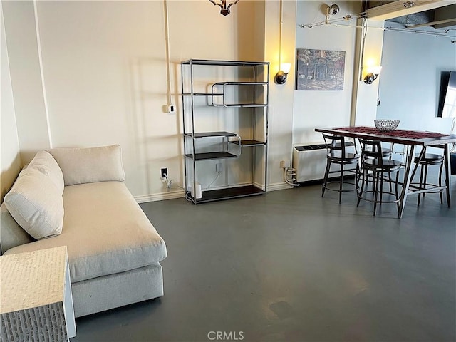 312 W 5th St Unit 1003, Los Angeles, CA 90013 - living room with baseboards and finished concrete flooring