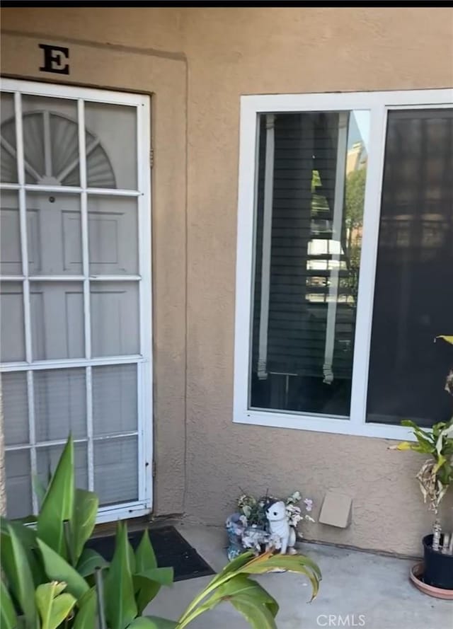 2714 S Montego # E, Ontario, CA 91761 - entrance to property featuring stucco siding