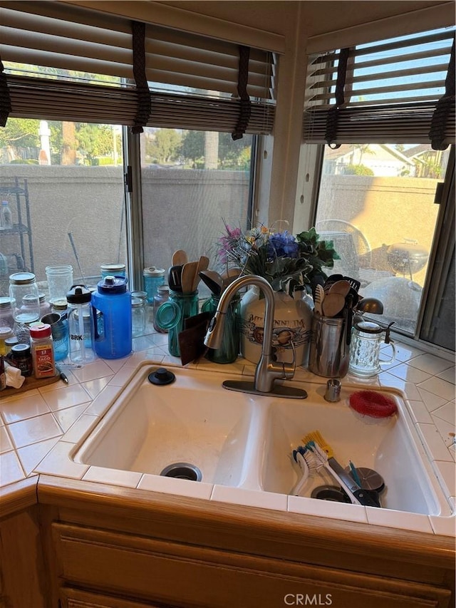 2714 S Montego # E, Ontario, CA 91761 - kitchen view of tile counters and a sink