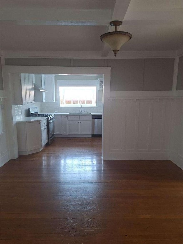 2109 N Marengo Ave, Altadena, CA 91001 - kitchen featuring gas range gas stove, dishwasher, a decorative wall, exhaust hood, and wood finished floors
