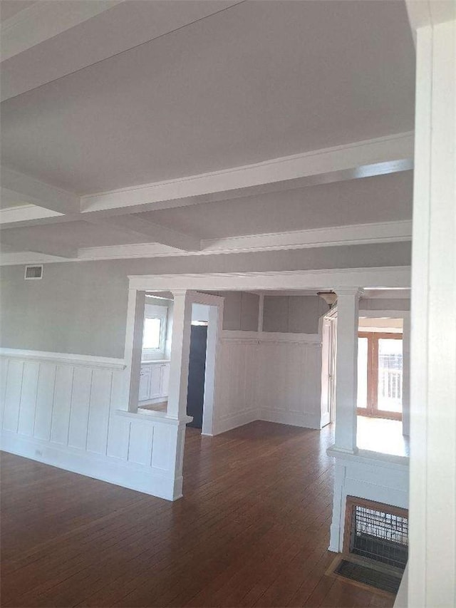 2109 N Marengo Ave, Altadena, CA 91001 - spare room with hardwood / wood-style floors, beam ceiling, a decorative wall, a wainscoted wall, and ornate columns