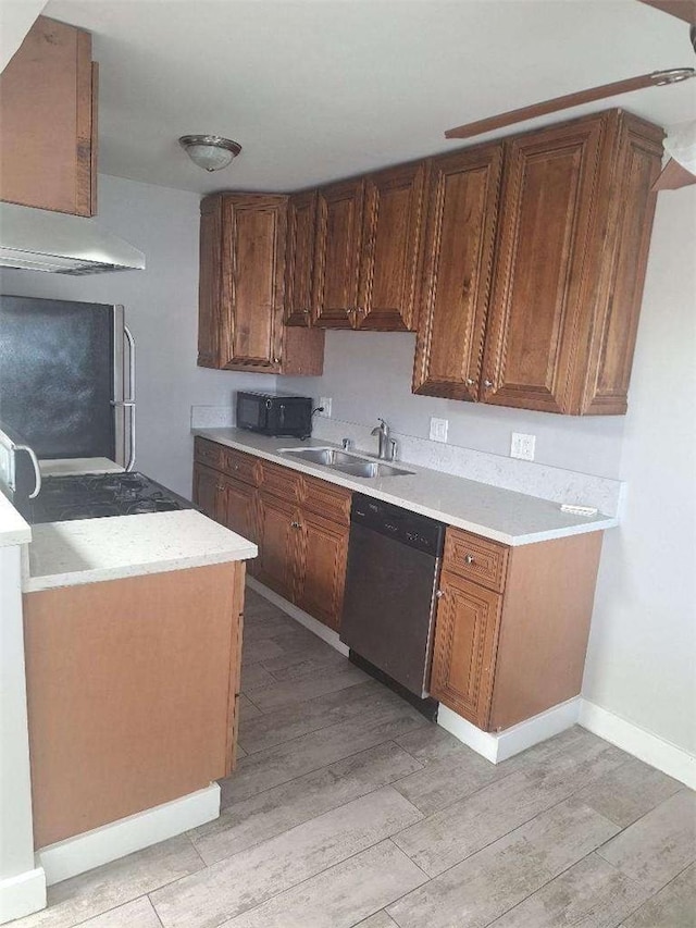 2109 N Marengo Ave, Altadena, CA 91001 - kitchen with stainless steel appliances, light wood-type flooring, light countertops, and under cabinet range hood