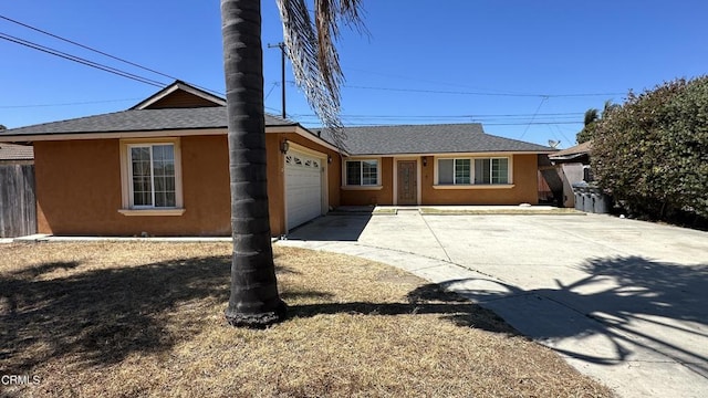 325 Del Sur Way, Oxnard, CA 93033 - single story home featuring a garage, driveway, stucco siding, and a shingled roof
