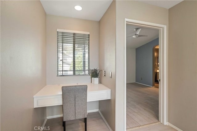 23612 Muir Trl Unit 74, Valencia, CA 91354 - office area featuring arched walkways, wood finished floors, and a ceiling fan