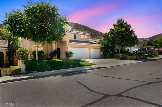 29063 Boulder Crest Way, Menifee, CA 92584 - view of front of house featuring driveway, stucco siding, a tiled roof, a garage, and a mountain view