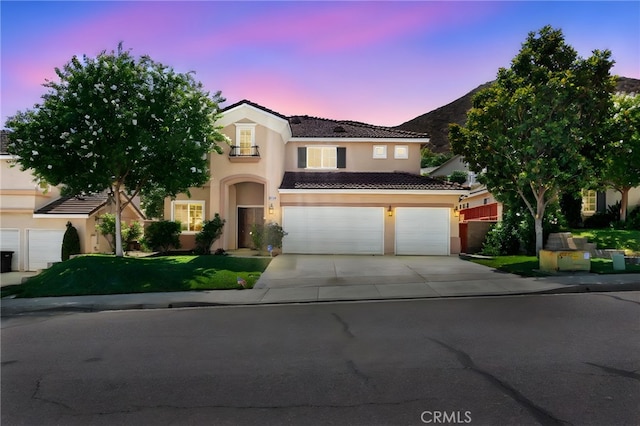 29063 Boulder Crest Way, Menifee, CA 92584 - view of front of home featuring concrete driveway, stucco siding, a tile roof, and a garage