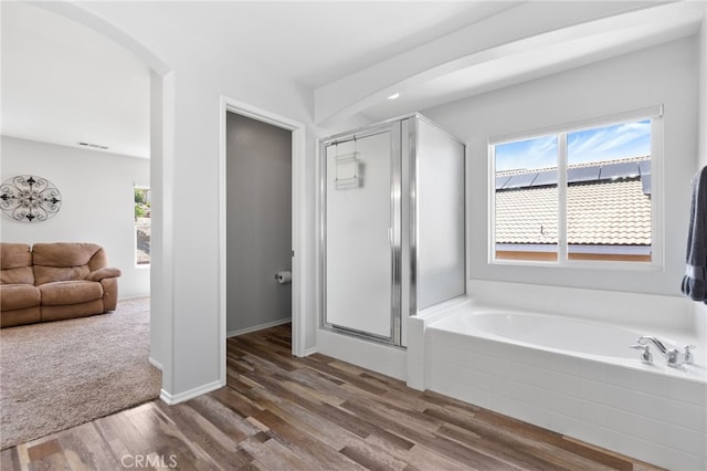 29063 Boulder Crest Way, Menifee, CA 92584 - full bathroom featuring a stall shower, a bath, and wood finished floors