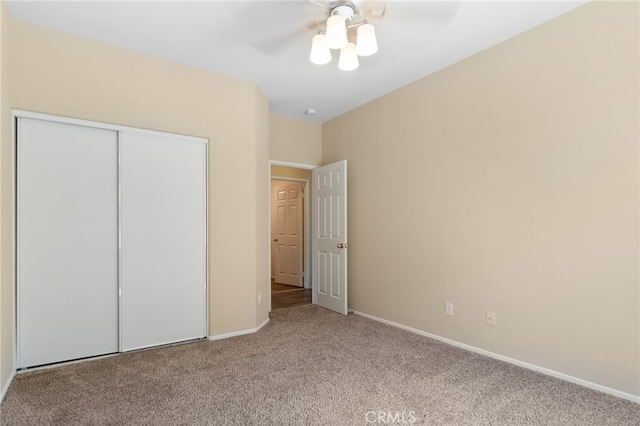 29063 Boulder Crest Way, Menifee, CA 92584 - unfurnished bedroom featuring carpet flooring, a closet, and ceiling fan