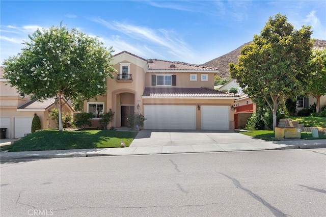 29063 Boulder Crest Way, Menifee, CA 92584 - view of front of home with stucco siding, driveway, a tile roof, a garage, and a front yard