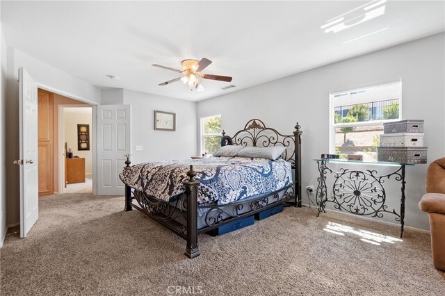 29063 Boulder Crest Way, Menifee, CA 92584 - carpeted bedroom with a ceiling fan