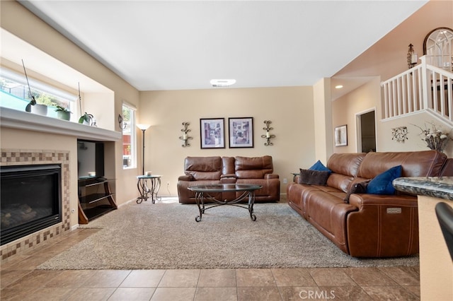 29063 Boulder Crest Way, Menifee, CA 92584 - carpeted living room with a tile fireplace and baseboards