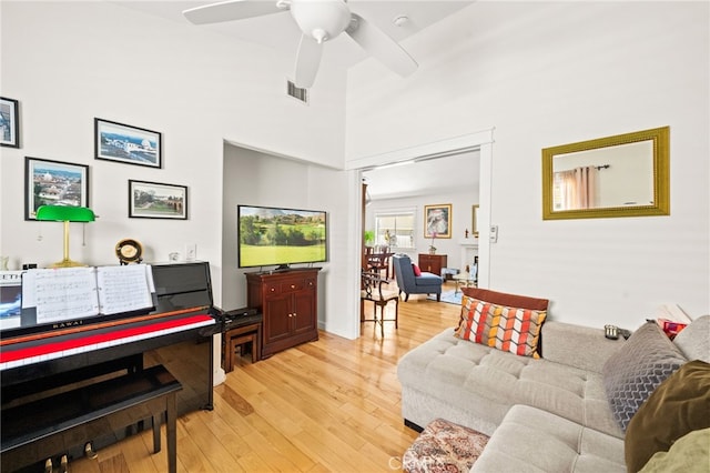 23974 Via Astuto, Murrieta, CA 92562 - living room with a ceiling fan and light wood finished floors