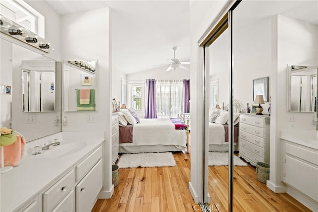 23974 Via Astuto, Murrieta, CA 92562 - bathroom featuring ensuite bath, ceiling fan, wood finished floors, and lofted ceiling