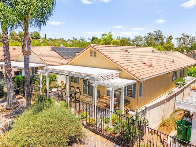 23974 Via Astuto, Murrieta, CA 92562 - rear view of house featuring a pergola, a tile roof, a fenced backyard, and stucco siding
