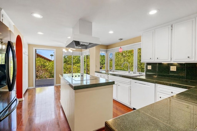 4750 Jeffer Ln, La Mesa, CA 91941 - kitchen with white dishwasher, smart refrigerator, exhaust hood, wood finished floors, and a center island