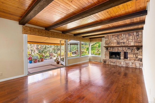 4750 Jeffer Ln, La Mesa, CA 91941 - unfurnished living room featuring hardwood / wood-style floors, a fireplace, and a wooden ceiling with exposed beams