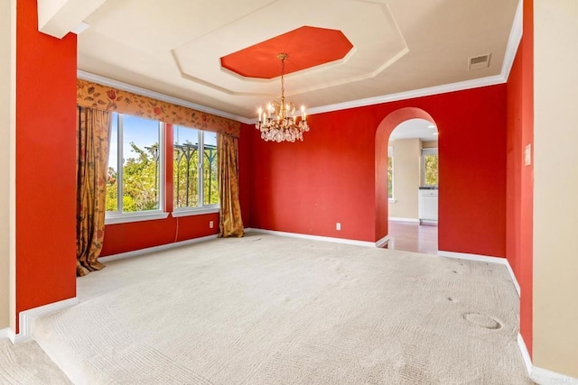 4750 Jeffer Ln, La Mesa, CA 91941 - empty room with arched walkways, carpet flooring, a chandelier, a raised ceiling, and ornamental molding
