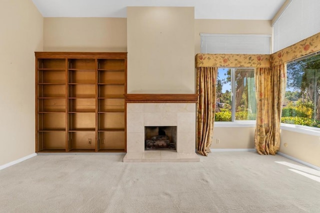 4750 Jeffer Ln, La Mesa, CA 91941 - unfurnished living room featuring carpet floors, healthy amount of natural light, and a tile fireplace