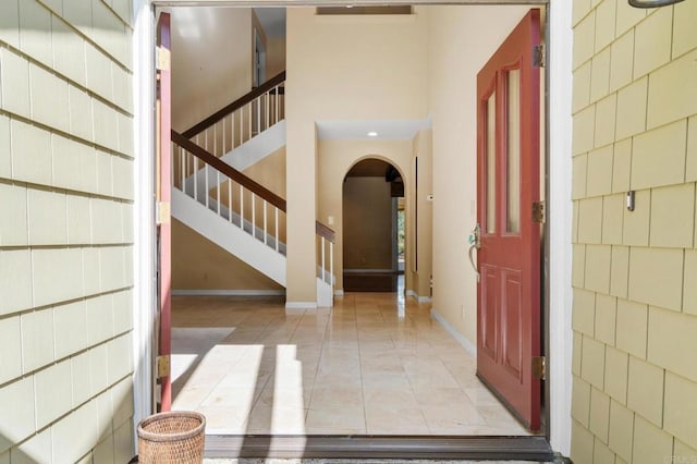 4750 Jeffer Ln, La Mesa, CA 91941 - entrance foyer with stairs, light tile patterned flooring, and arched walkways