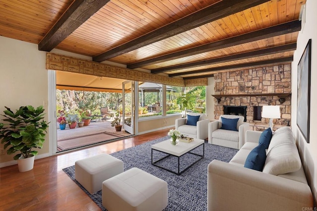 4750 Jeffer Ln, La Mesa, CA 91941 - living room featuring a wooden ceiling with exposed beams, wood finished floors, and a stone fireplace